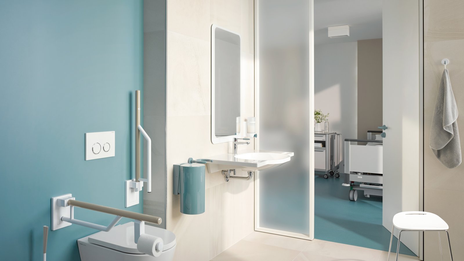 Barrier-free patient bathroom equipped with white and blue sanitary accessories